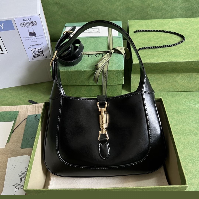 G*u*i top handle bags